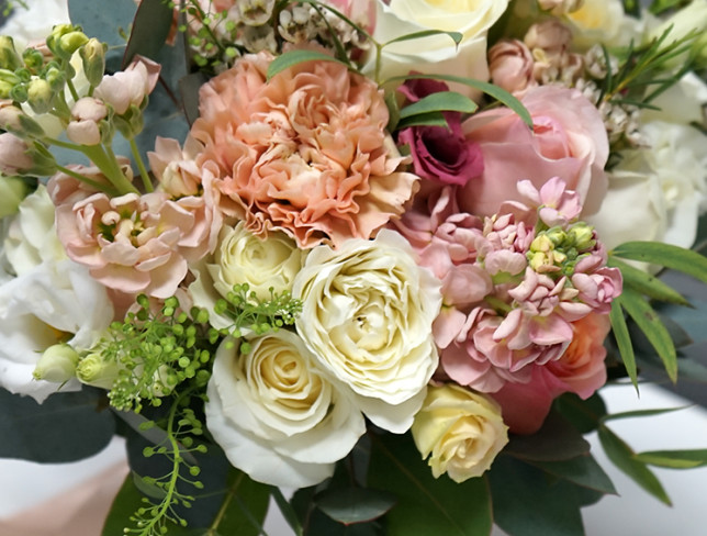 Bride's bouquet in soft pastel colors photo
